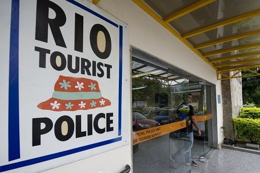 The three suspects in the rape of a US student were brought before the press at this police station on April 2, 2013